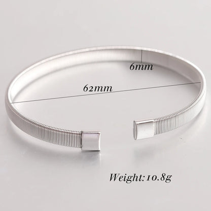 ElegantMesh: Contemporary C-Shaped Mesh Bangle in Stainless Steel